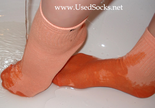 used socks soaking in bath